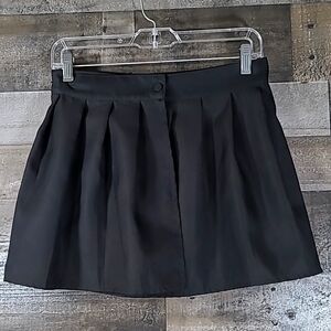 Spirit Halloween Size Medium black skirt with adjustable button closure